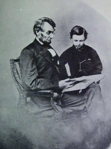 Lincoln and his
                                                    son, Tad